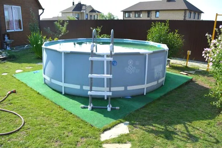 What to put under an inflatable pool on grass